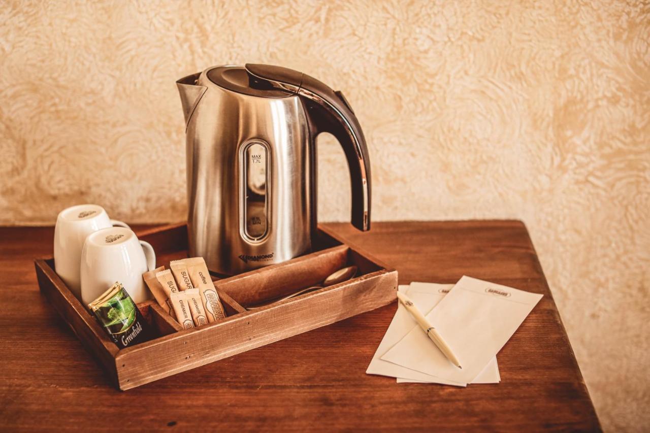 Caucasus Hotel Kasagh Exterior foto A kettle in a hotel room